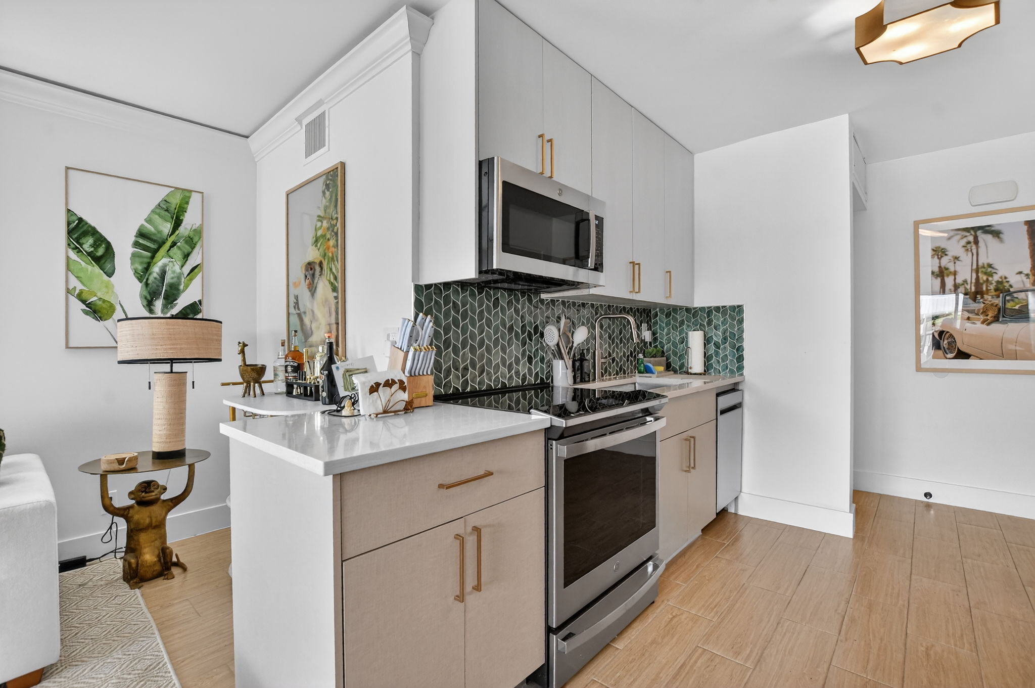 Modern kitchen with green tile backsplash
